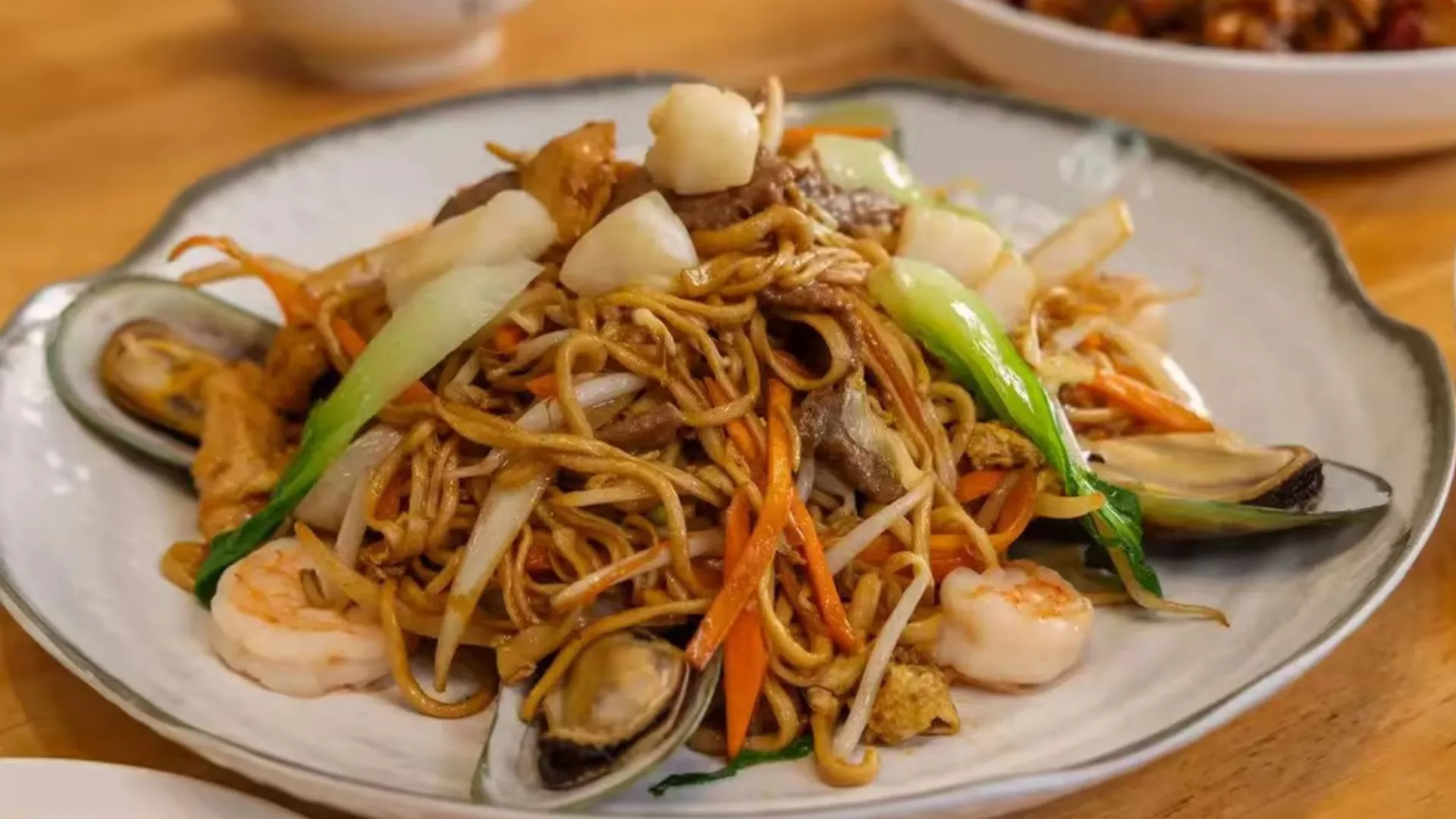 Seafood lo mein with shrimp and mussels at TastiGo Kitchen, an Asian Fusion Restaurant in Miami